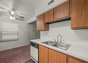 Thumbnail 2 of 25 - Kitchen and Dining Area in apartment