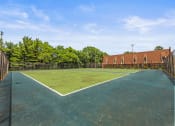 Thumbnail 18 of 25 - tennis court at apartment community