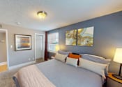 Thumbnail 1 of 12 - Primary apartment bedroom with big window