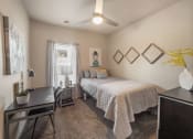 Thumbnail 5 of 34 - a bedroom with ceiling fan
