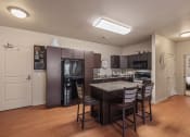 Thumbnail 3 of 34 - Black Kitchen Appliances and granite countertop