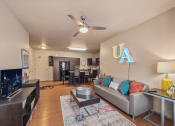 Thumbnail 2 of 34 - apartment living room with a couch and TV