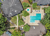 Thumbnail 21 of 29 - The Earl Apartments aerial view of pool