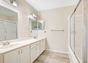 Thumbnail 5 of 29 - Bathroom with double sink and lots of storage space