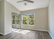 Thumbnail 10 of 29 - Bedroom with window and fan