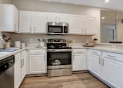 Thumbnail 15 of 29 - Large updated kitchen with lots of storage space