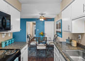 Thumbnail 4 of 31 - Apartment Kitchen with appliances