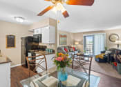 Thumbnail 1 of 31 - apartment living room and kitchen with a table