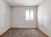 Thumbnail 7 of 23 - bedroom with carpet and a window