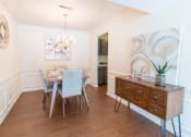 Thumbnail 5 of 29 - dining area with wood style flooring in apartment unit