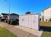 Thumbnail 19 of 29 - A grey storage unit with a blue sign on it.