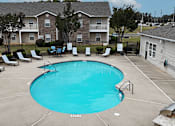 Thumbnail 22 of 29 - A small pool with a metal fence around it.