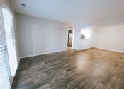 Thumbnail 5 of 26 - open living room with natural lighting at the plaza at lamberton 