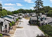 Thumbnail 23 of 26 - A residential area with houses and trees.