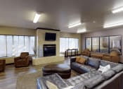 Thumbnail 20 of 23 - clubhouse with couches chairs and a fireplace