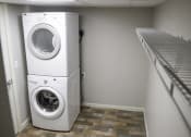 Thumbnail 11 of 23 - a washer and dryer in an apartment
