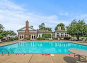 Thumbnail 27 of 39 - outdoor swimming pool at apartment community