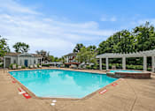 Thumbnail 24 of 39 - apartment complex with pool