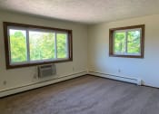 Thumbnail 4 of 28 - an empty room with two windows