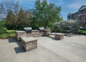Thumbnail 17 of 28 - the backyard has a large patio with a grill and bbq area