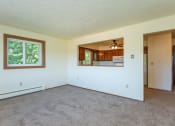 Thumbnail 2 of 28 - an empty living room with a large window