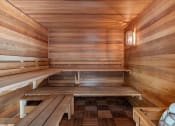 Thumbnail 26 of 27 - a wooden sauna with benches on the floor