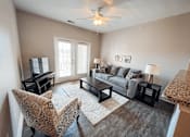 Thumbnail 1 of 29 - A living room with hardwood style flooring