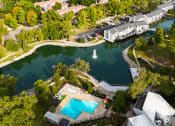 Thumbnail 16 of 20 - arial view of the pool and lake at the resort