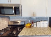 Thumbnail 5 of 20 - apartment kitchen with updated appliances
