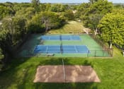 Thumbnail 17 of 20 - aerial view of a tennis court at apartment community
