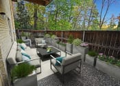 Thumbnail 19 of 22 - a patio with couches and chairs and a table