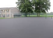 Thumbnail 13 of 23 - The Village Quarter Apartments tennis court