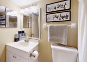 Thumbnail 7 of 15 - bathroom with a toilet and sink