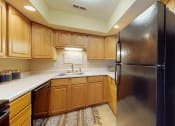 Thumbnail 1 of 15 - Apartment Kitchen with appliances including dishwasher