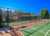 Thumbnail 11 of 15 - tennis court at apartments