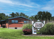 Thumbnail 14 of 16 - sign for Village Square Apartments