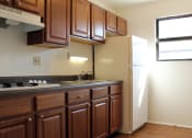 Thumbnail 3 of 16 - Apartment Kitchen with Cabinet Space