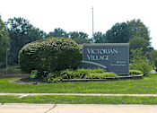 Thumbnail 13 of 22 - the welcome sign for Victorian Village Townhomes