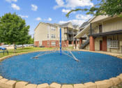 Thumbnail 20 of 23 - playground at apartment community