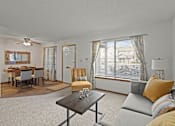 Thumbnail 3 of 23 - Living room with natural light and a large window with carpeting
