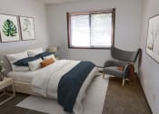 Thumbnail 11 of 15 - Bedroom with lots of Natural light at west broadway apartments