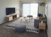 Thumbnail 8 of 15 - Living room at west broadway apartment with large sliding glass doors
