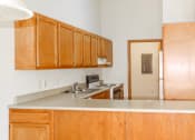 Thumbnail 3 of 30 - Kitchen area with lots of storage space at willow crossings apartments