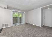 Thumbnail 3 of 12 - living room with a door to a balcony