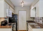 Thumbnail 1 of 11 - kitchen with appliances in apartment