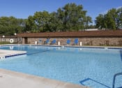 Thumbnail 4 of 13 - Large pool and sundeck at Windsor gates Apartments