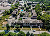 Thumbnail 26 of 26 - aerial view of a large suburban neighborhood with many homes