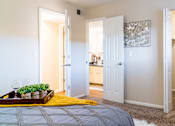 Thumbnail 10 of 26 - Primary Bedroom with Connected Bathroom