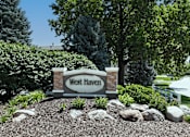 Thumbnail 27 of 33 - A sign that says West Haven in front of a tree.