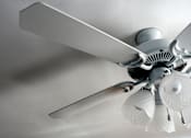 Thumbnail 7 of 8 - A white ceiling fan with a light fixture is mounted on a white ceiling.